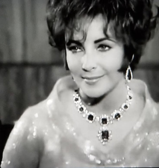 Sparkling Elegance: The Evolution of Long Rhinestone Necklaces from the Modern Era