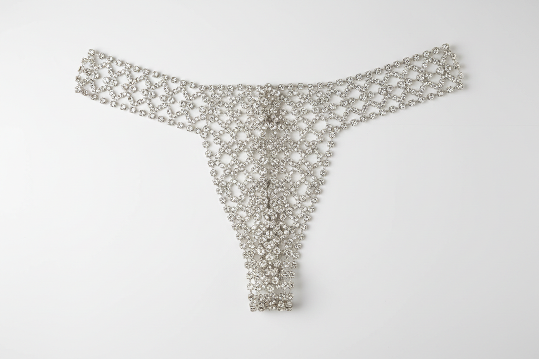 Close-up of rhinestone underwear showing crystal embellishments and smooth fabric lining, fashion accessory detail